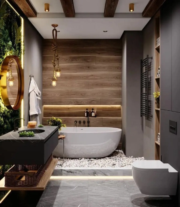 Luxury bathroom with bathtub, stone decor, wooden feature wall, round mirror, and elegant design